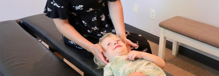 Chiropractor Minnetonka MN Julia Anderson Adjusting Toddler