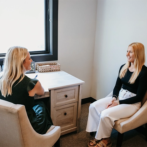 Chiropractor Minnetonka MN Doctor Consulting With Patient HP